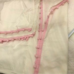 Pottery Barn crib skirt, white with pink tassel trim